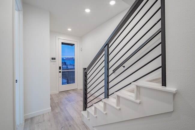 Building Photo - Gated Luxury Townhomes with yard + Roof Patio