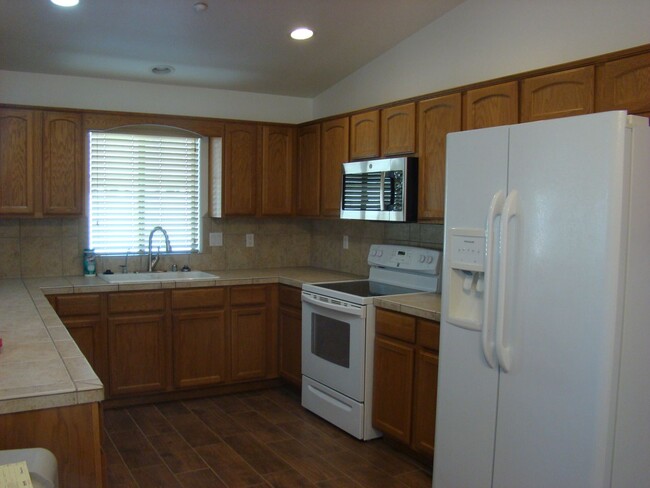 Building Photo - New lower price for this Jamaica Village C...