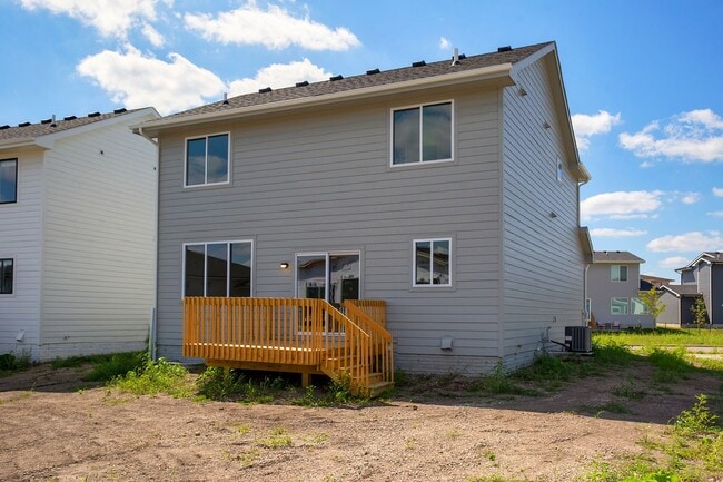 Building Photo - Spacious 4-Bedroom Home with 2-Car Garage & Yard