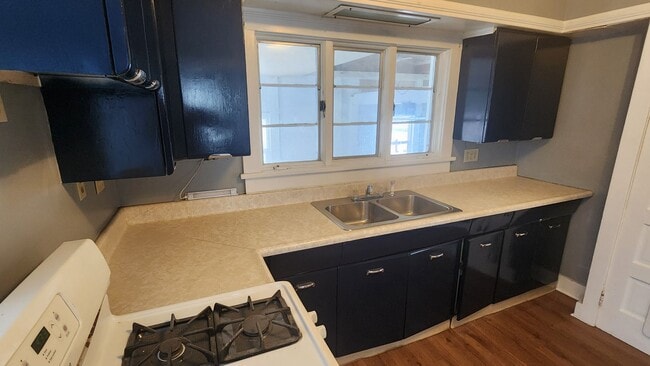 Building Photo - Cozy 3 bedroom Cape Cod with attached garage! First floor offers living room, formal dining, and ...