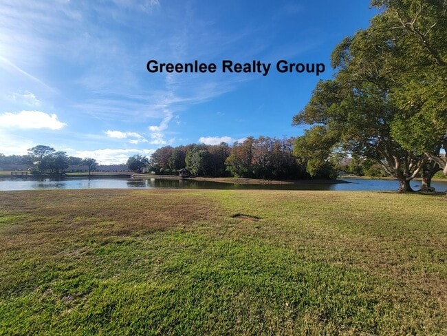 Building Photo - Fully furnished waterfront 55+ rental with beautiful updates, great amenities, and all utilities ...