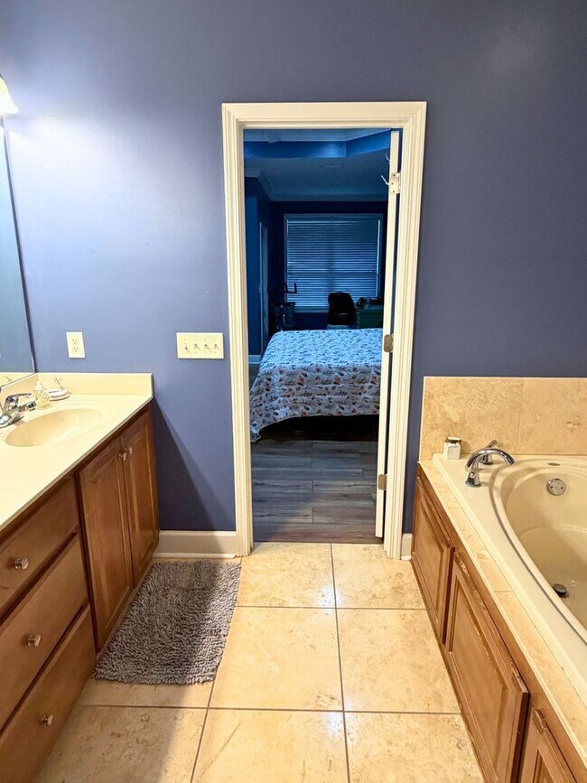 Building Photo - 3/2 with grass cutting included & access to community amenities.