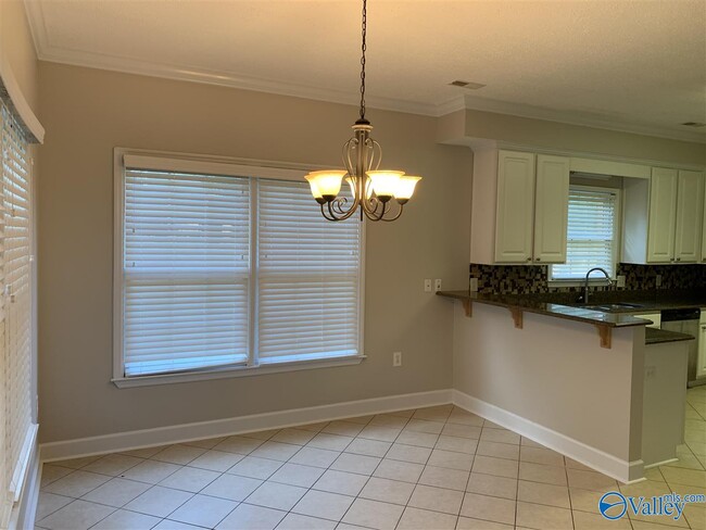 Building Photo - 129 Cannes Dr SE