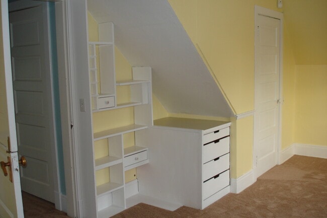 Back Bedroom with built-in's, door to attic on the right, door from hallway on the left - 3402 N 28th St