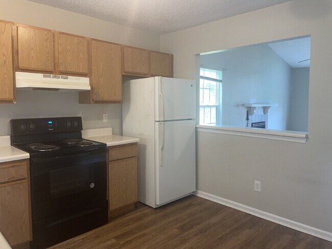 Building Photo - Two Bedroom Two Full Bathroom End Unit Tow...