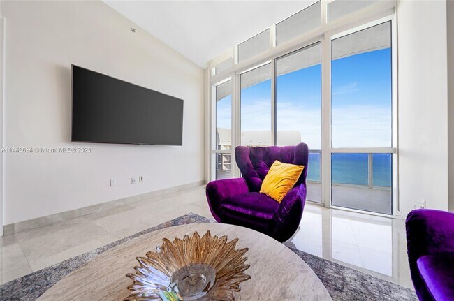 Building Photo - 15811 Collins Ave