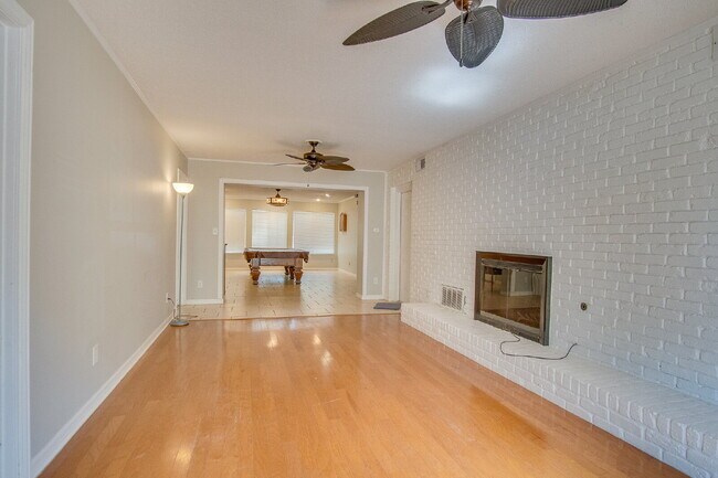 Building Photo - Pool Home with Office, Two Primary Suites ...