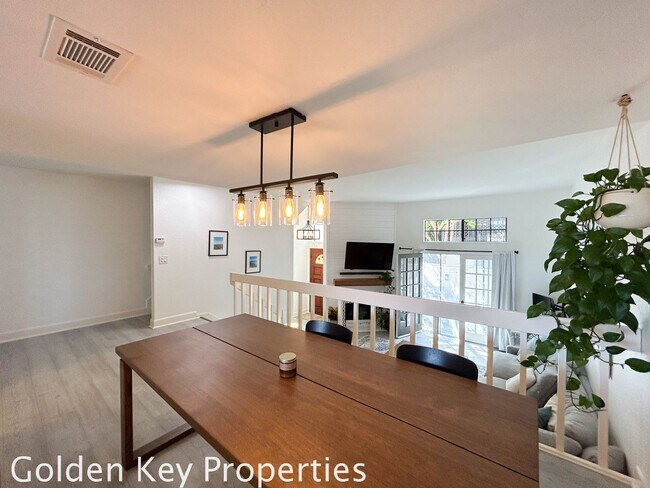 Building Photo - Welcome to this stunning ***unfurnished*** tri-level condo in the desirable Casitas de la Costa c...