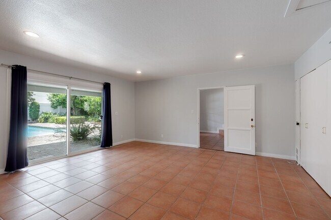 Building Photo - Spacious 5-Bedroom, 3-Bath Home with Pool ...