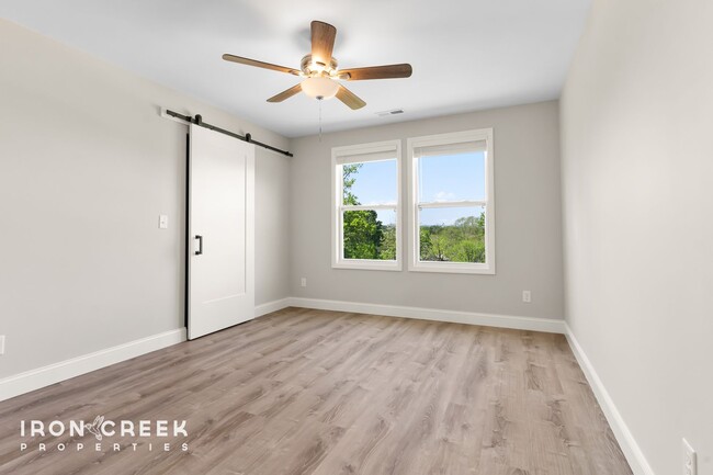 Building Photo - Bright and Modern: New Construction Three-...
