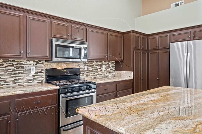 Building Photo - A Beautiful Corona Home Designed for Open Space and Comfortable Living