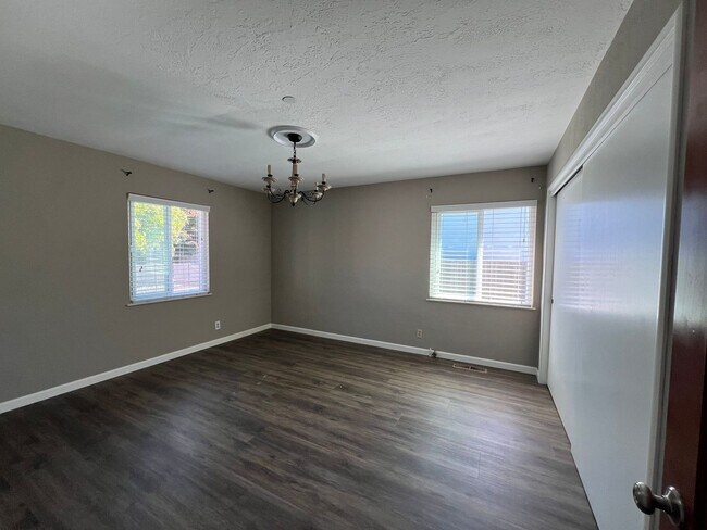 Building Photo - Spacious 4-Bedroom Retreat Just Steps from...