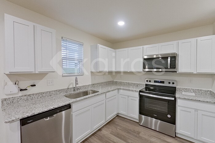 Building Photo - 7004 Peppermill Way