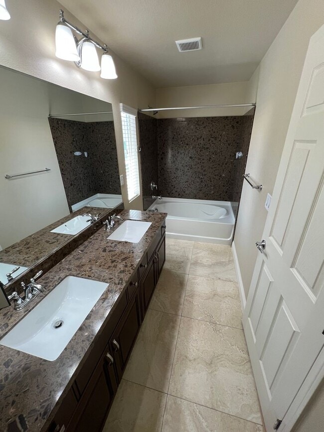 Building Photo - A Fantastic 4 Bedroom Home with the primary Downstairs, in Silverado Ranch