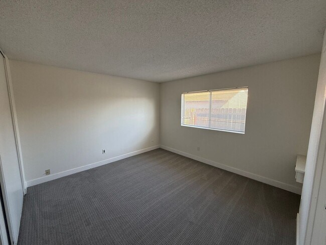 Building Photo - 4 Bedroom, 2 Bath Home with Large Yard + Two Car Garage