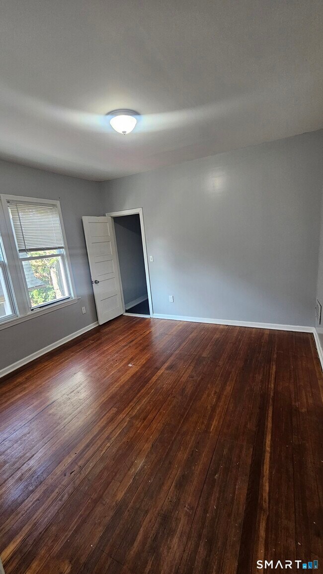 Building Photo - 142-144-144 Adams St