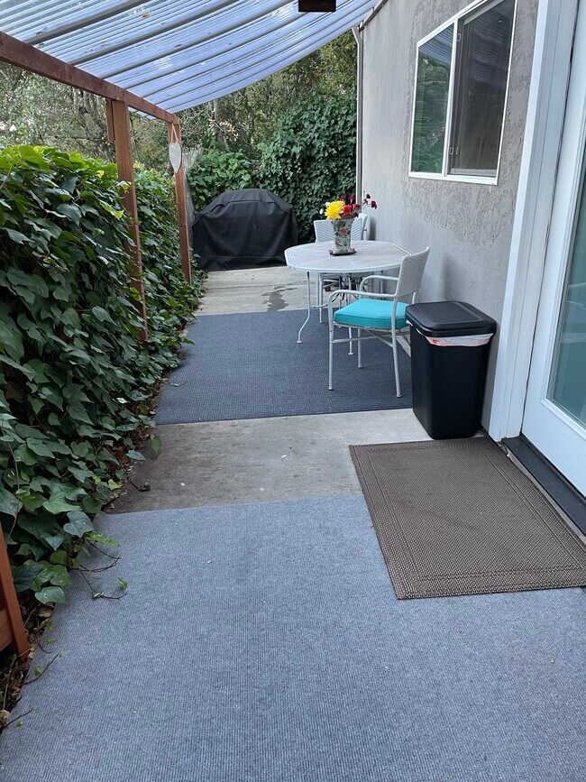 Patio with BBQ. Door to BR#1 - 27 Graceland Dr