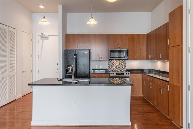 Building Photo - 711 Cosmopolitan Dr NE