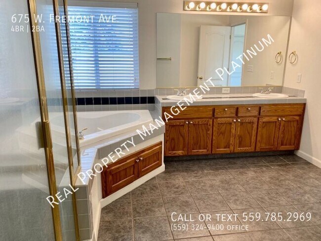 Building Photo - $2,395  Willow and Herndon, 4 Bedroom,  - ...