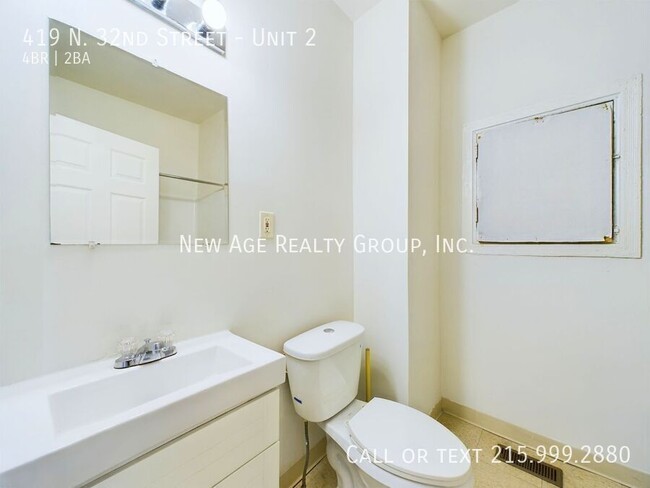 Building Photo - Spacious, Bi-level Apartment Available at ...