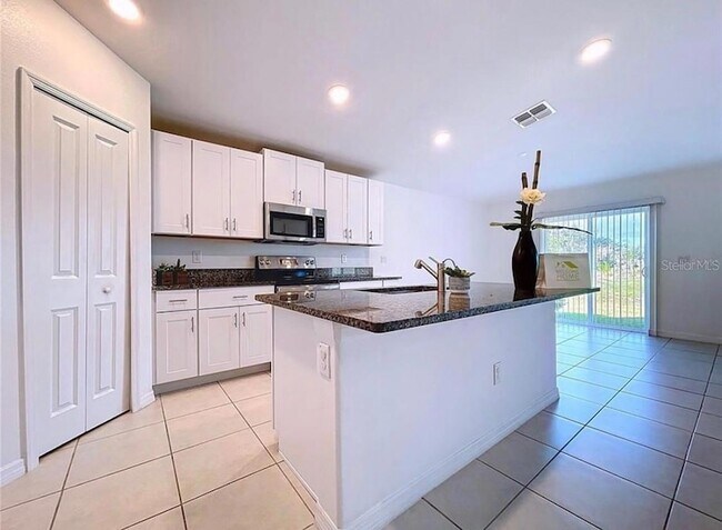 Building Photo - 6557 Bar S Bar Trl