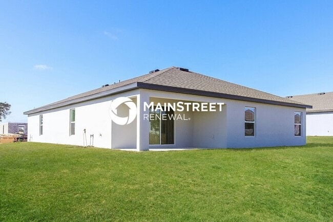 Building Photo - 4 Bedroom Pet-Friendly Home in Mascotte, FL with Main Street Renewal
