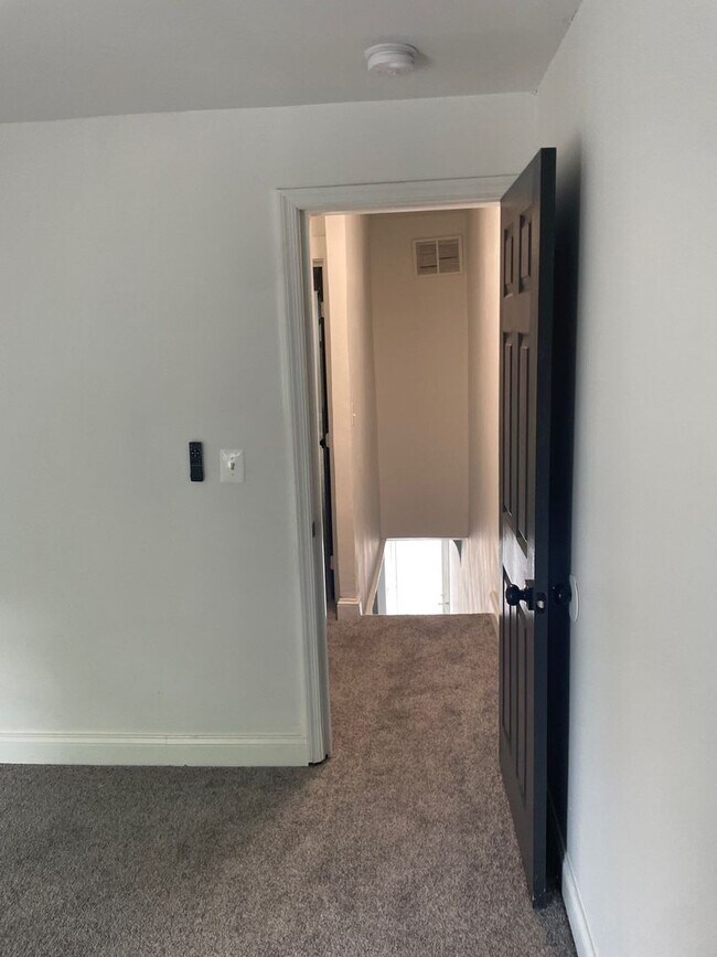 Building Photo - Historic Charm Meets Modern Comfort: 2BR Baltimore Townhouse with Private Yard