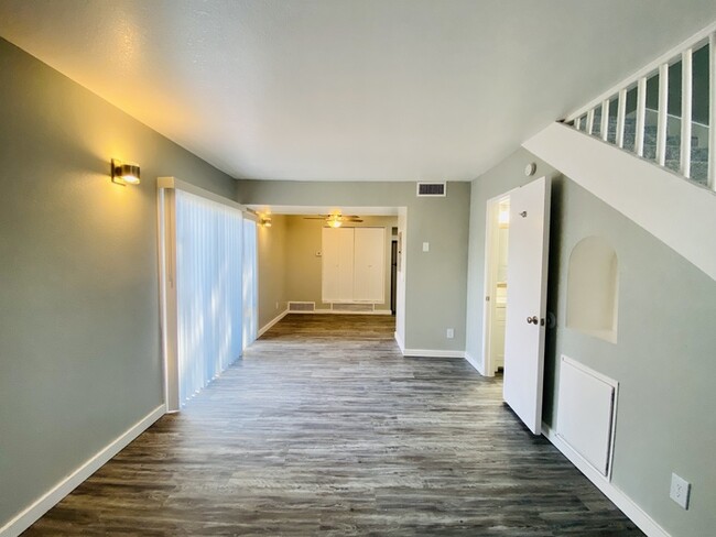 Building Photo - Renovated Townhome with Spacious Yard! W/D...