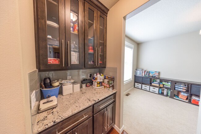 Building Photo - Four Bedroom Home + Bonus & Den in Gated C...
