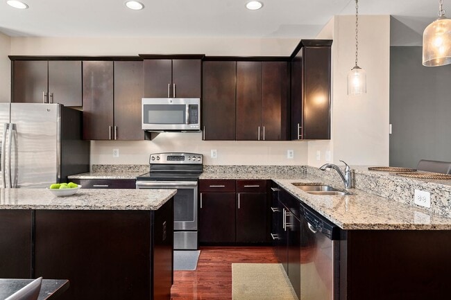 Building Photo - Luxury 3-Bed, 4-Bath Townhouse with Modern Amenities