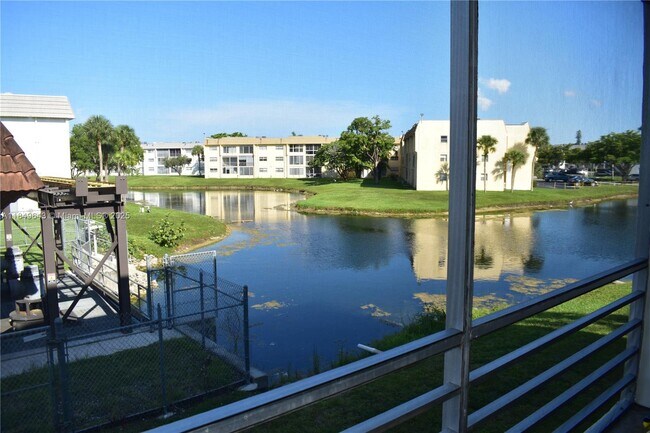 Building Photo - 8590 Sunrise Lakes Blvd