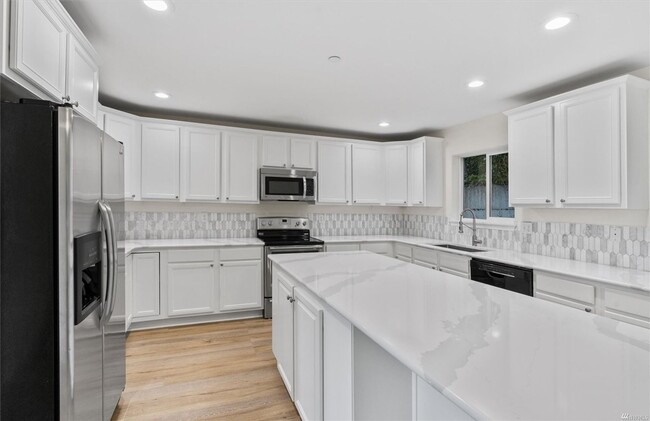 Building Photo - Spacious 4-Bedroom Home with Scenic Views & Versatile Living Spaces