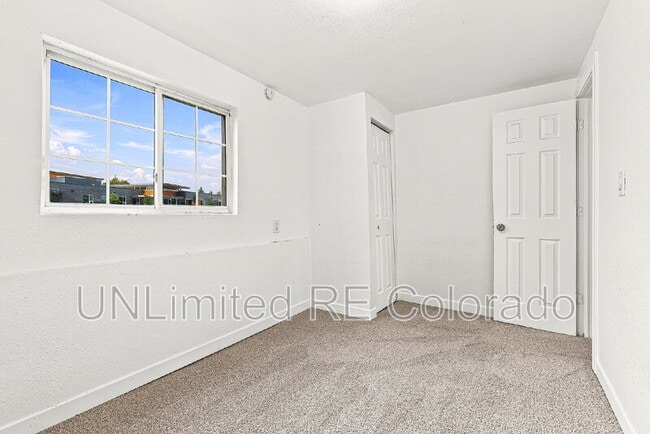 Building Photo - 3668 E 91st Ave