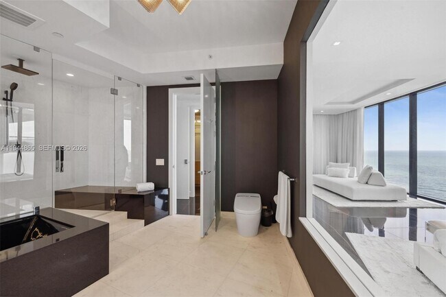 Building Photo - 18555 Collins Ave