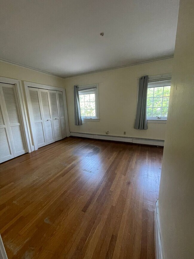 Building Photo - One Block to the Diag! Charming Home with Private Courtyard + Parking