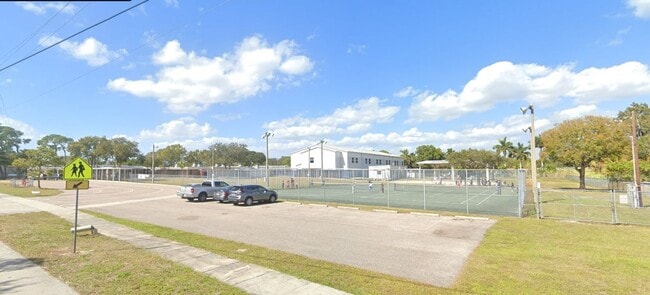 Building Photo - Green Tee - # 502