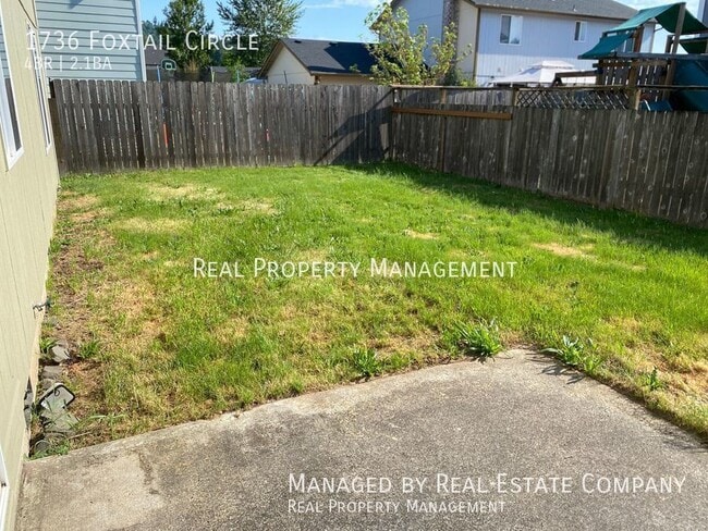 Building Photo - Woodland 4 Bed 2.5 Bath Home with Two Car ...