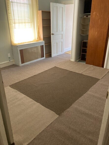 Center room, new carpeting, large closet with organizers, book shelves - 227 Buckingham Pl