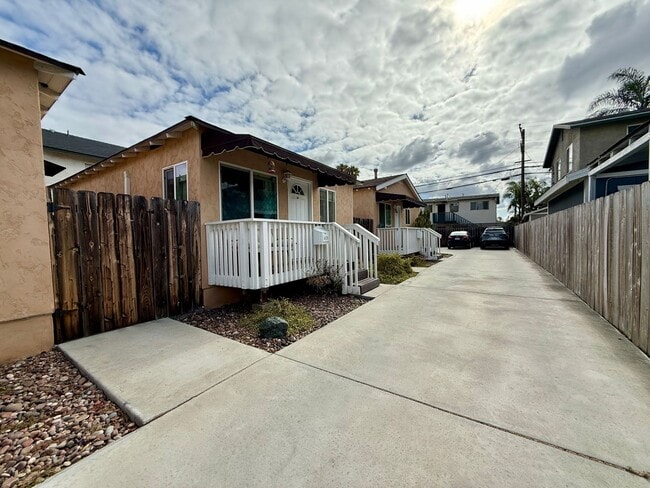 Building Photo - Modern Bungalow with W/D + A/C! Assigned Parking Included & 1 Garage Storage!