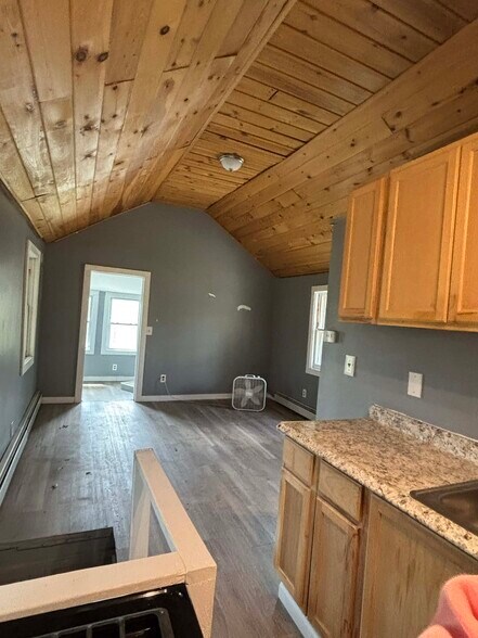 Angle of living room/kitchen from a different position in the house - 36 Maple Trl