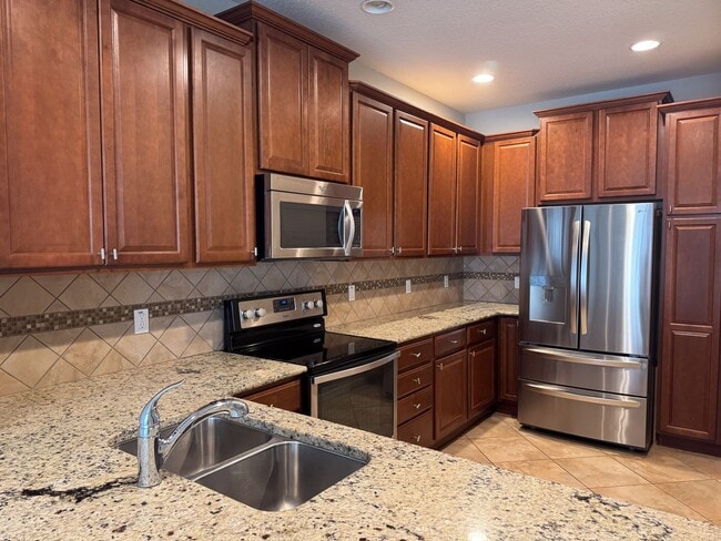 Building Photo - COMING OCTOBER!! Lake Nona 3 Bedroom 3 Bat...