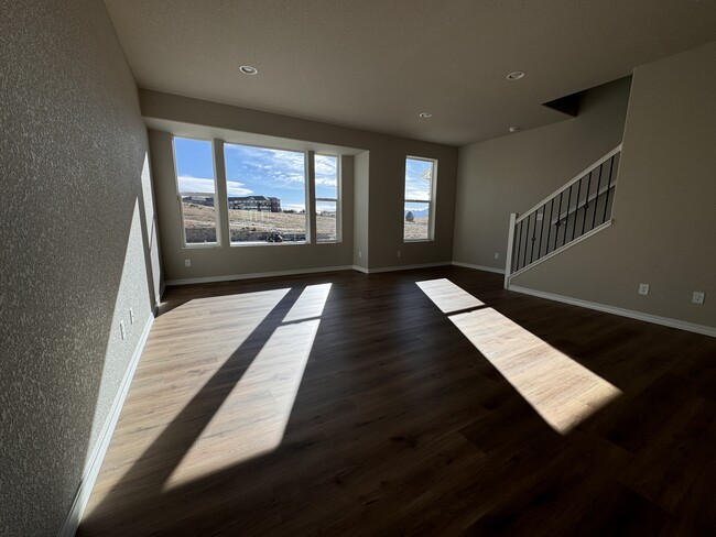 Laminate flooring with nice views from living room - 7738 Bone Creek Pt