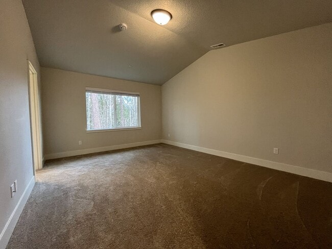 Building Photo - Modern 2025-Built 4 Bedroom Home with EV Charging, 5kW Solar, Open-Concept Living, Scenic Outdoor...