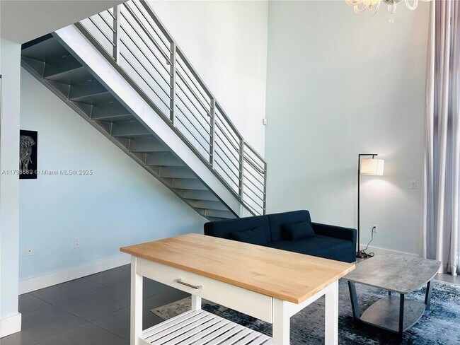 Building Photo - 7700 Collins Ave