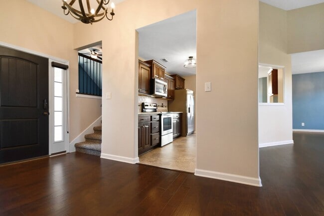 Building Photo - Pet Friendly Three Bedroom with Bonus!