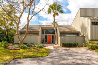 Building Photo - 9996 Sawgrass Dr E