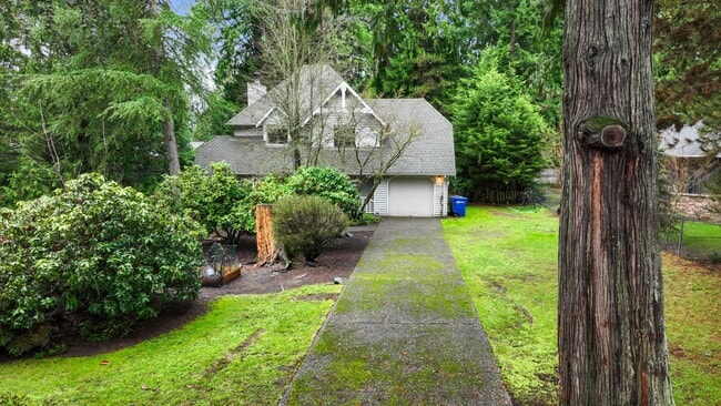 Building Photo - Bright 3-Bed Bothell Home with Attached Garage, Cozy Fireplace, and Private Garden Oasis