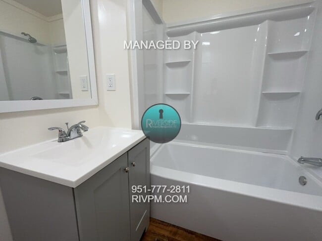 Building Photo - WELCOME TO YOUR NEW HOME IN THE WOOD STREE...