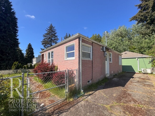 Building Photo - Timeless Charm Meets Comfort – 2-Bedroom Brick Home with Fireplace & Fenced Yard