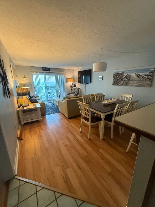 Building Photo - NEW OWNERS OF THIS FURNSIHED OFF-SEASON RE...